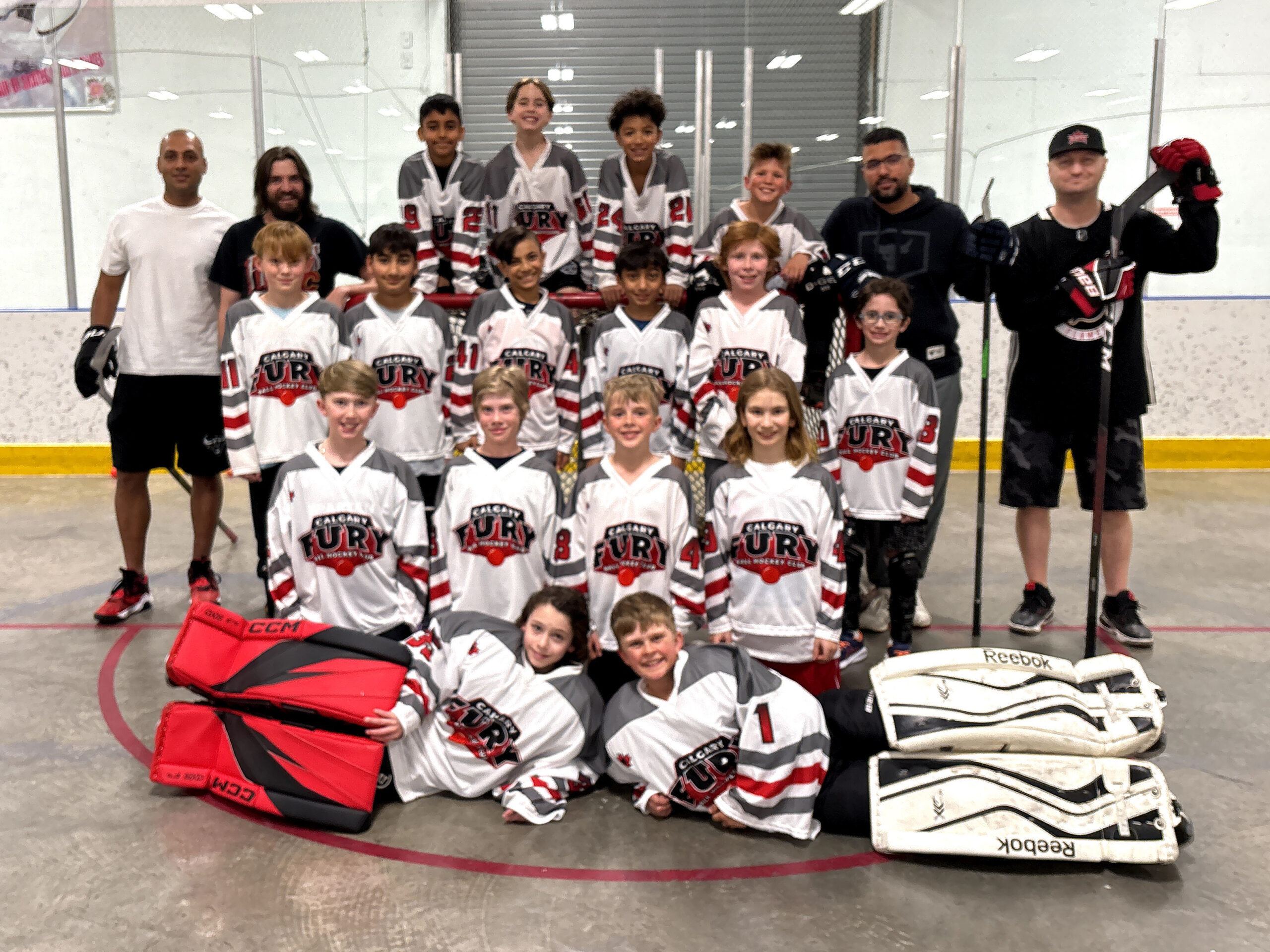 1 U11A USE U11A Team Group image of elite ball hockey players and coaches