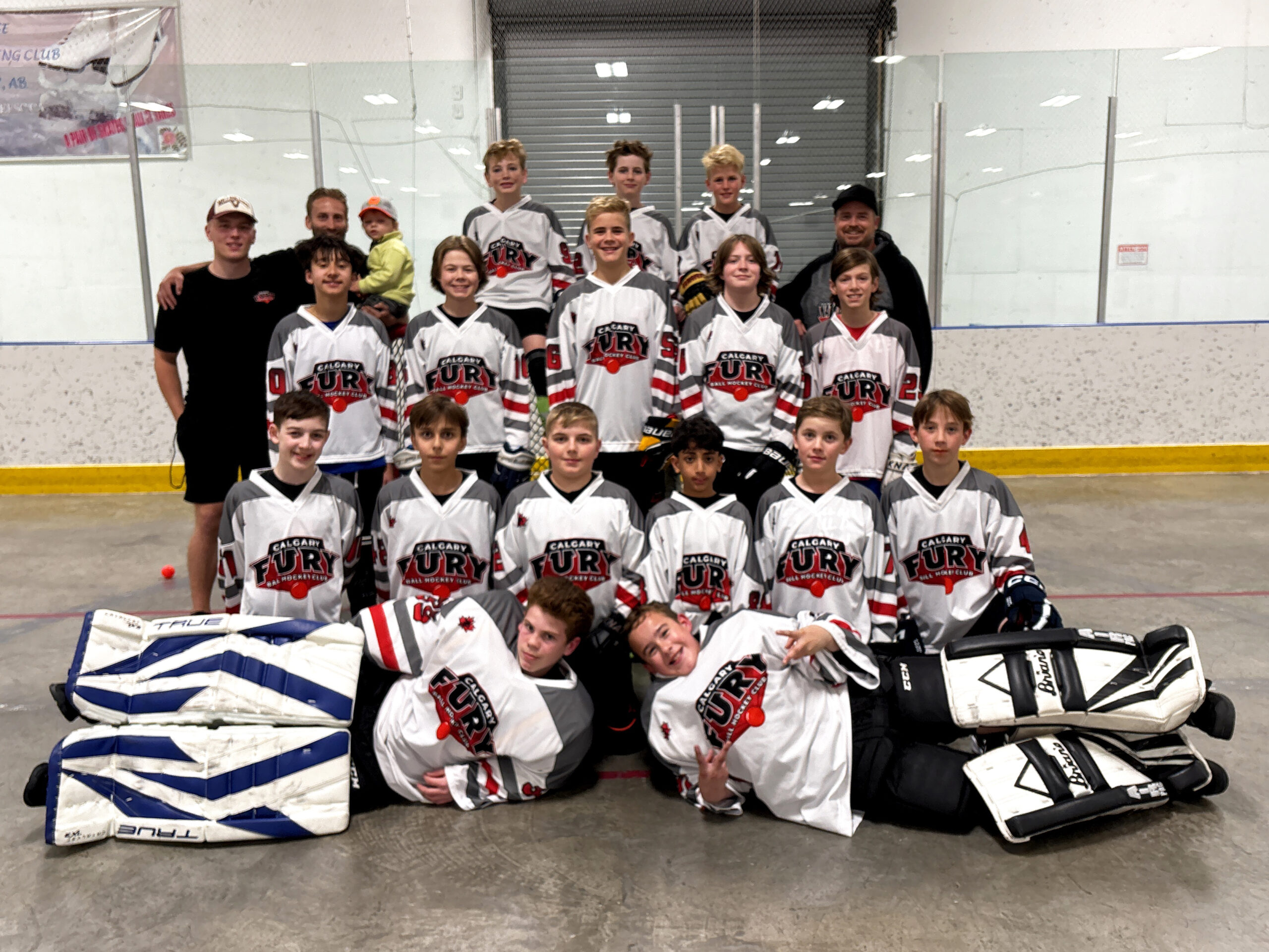 1 U13A USE U13A Team Group image of elite ball hockey players and coaches