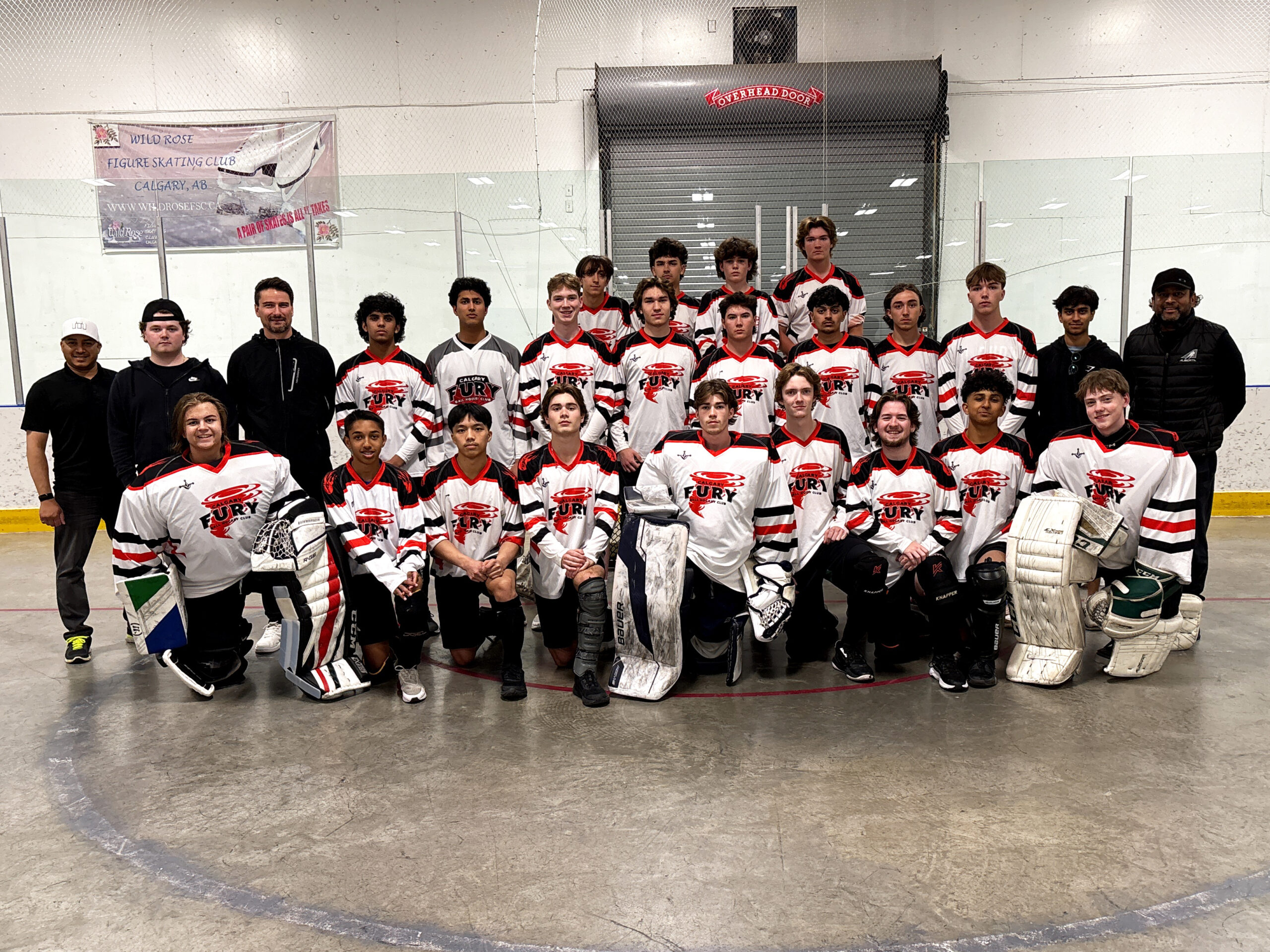 1 U18 USE U18 Team Group image of elite ball hockey players and coaches